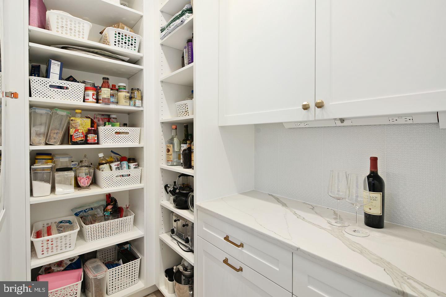 249 South 24th Street, Unit C Philadelphia, PA 19103 - Photo 11 of 35 a kitchen with a cabinets and white appliances
