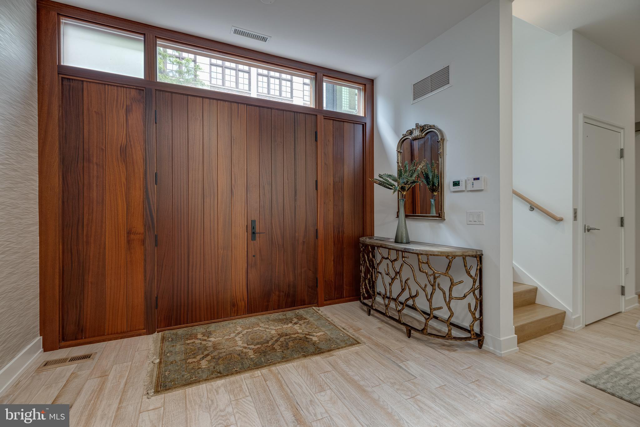 249 South 24th Street, Unit C Philadelphia, PA 19103 - Photo 3 of 35 a view of front door with wooden floor