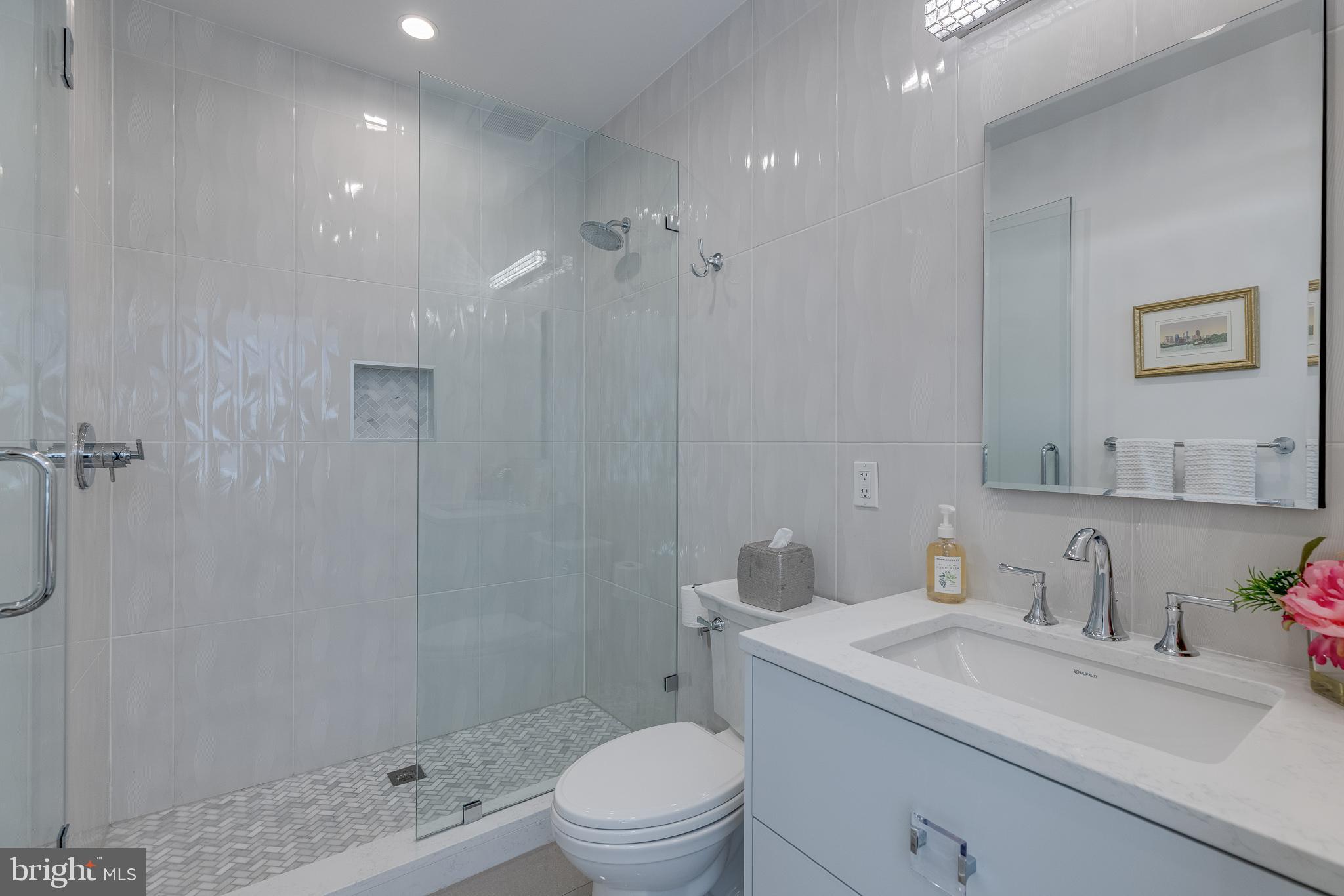 249 South 24th Street, Unit C Philadelphia, PA 19103 - Photo 25 of 35 a bathroom with a sink toilet and shower