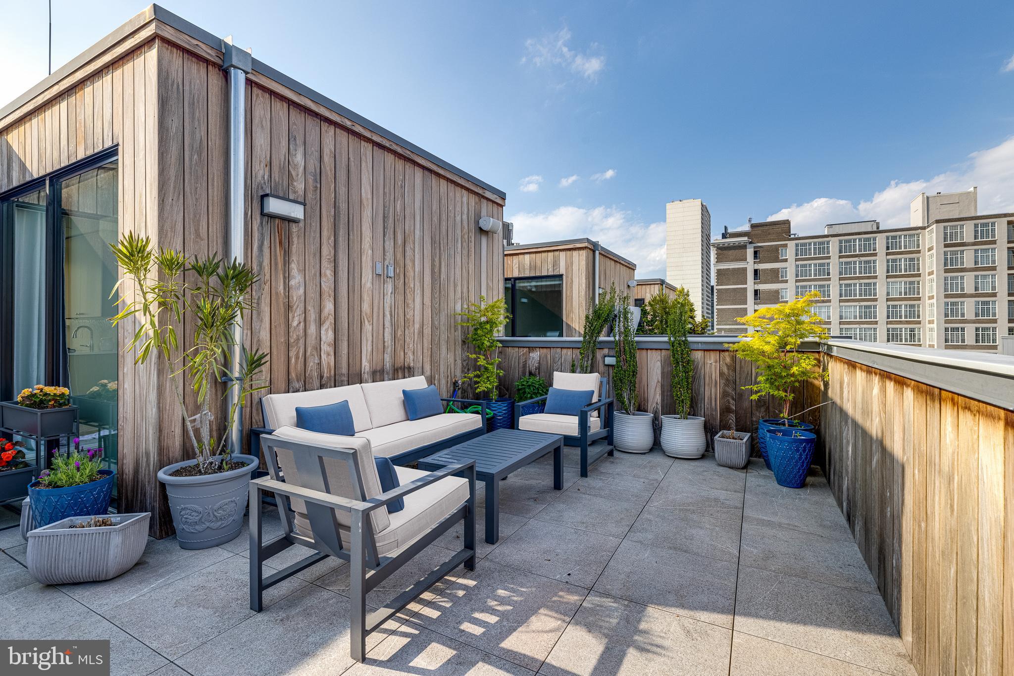 249 South 24th Street, Unit C Philadelphia, PA 19103 - Photo 28 of 35 a building outdoor space with patio furniture and potted plants
