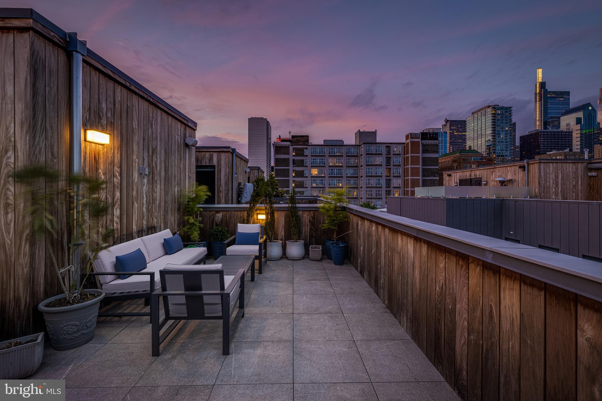 249 South 24th Street, Unit C Philadelphia, PA 19103 - Photo 31 of 35 a balcony with outdoor seating and city view