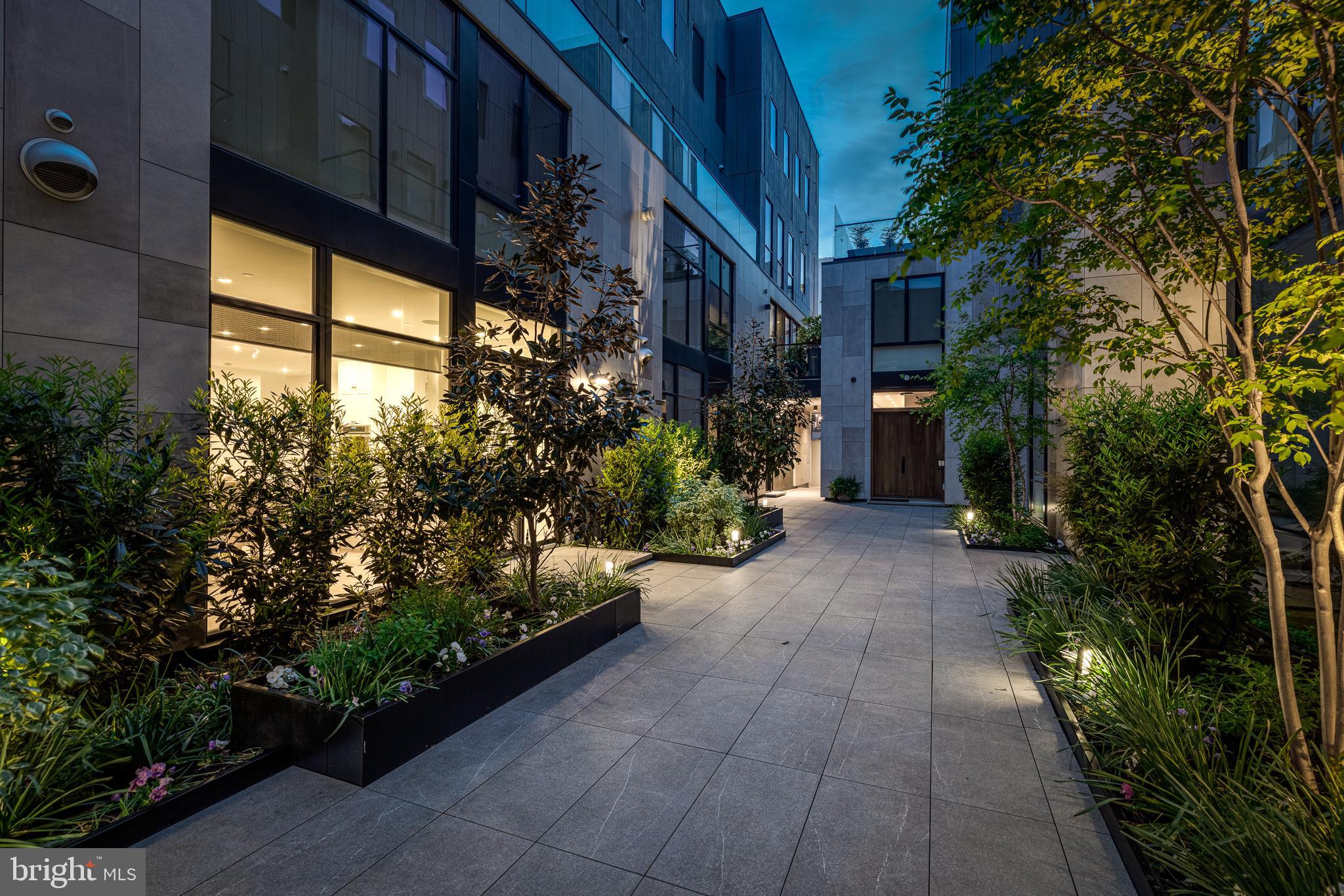 249 South 24th Street, Unit C Philadelphia, PA 19103 - Photo 34 of 35 a view of a pathway that has potted plants