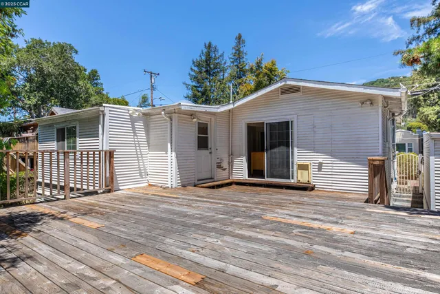 a front view of a house with a garage