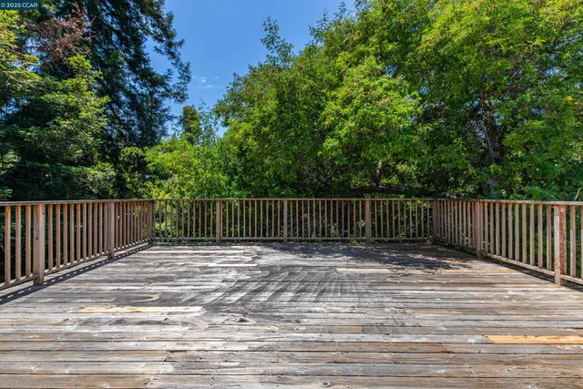 a view of a wooden fence
