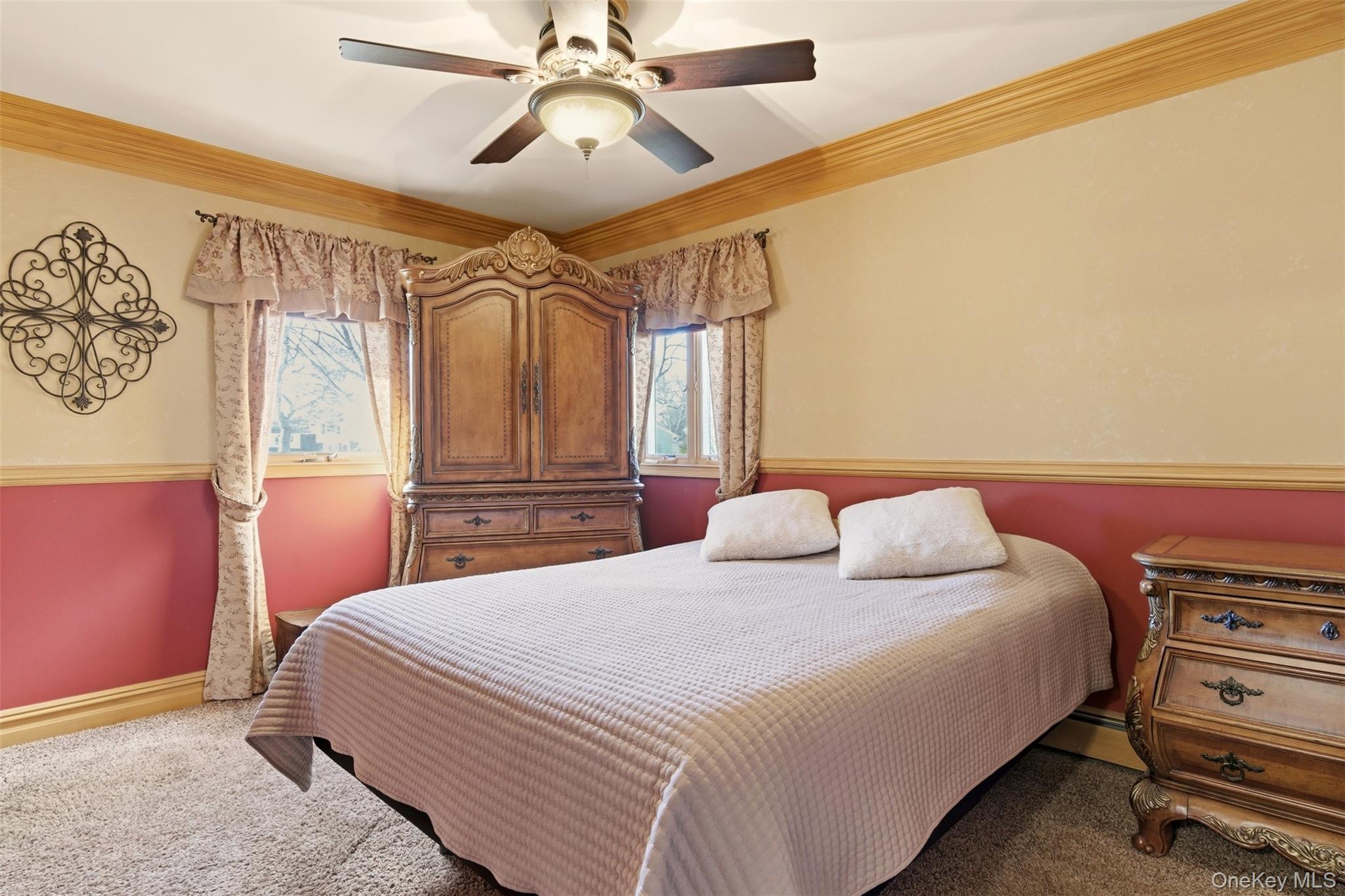 15 Leeward Lane Commack, NY 11725 - Photo 17 of 26 a bedroom with a bed dresser and a window