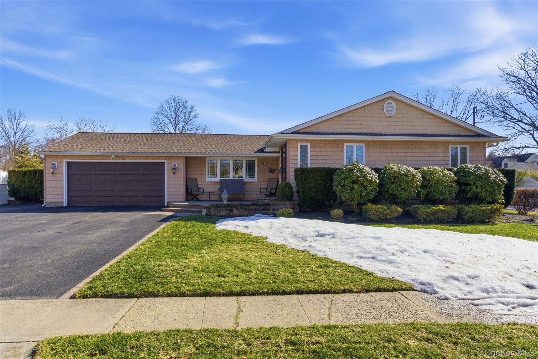 15 Leeward Lane Commack, NY 11725 - Photo 2 of 26 a front view of a house with garden