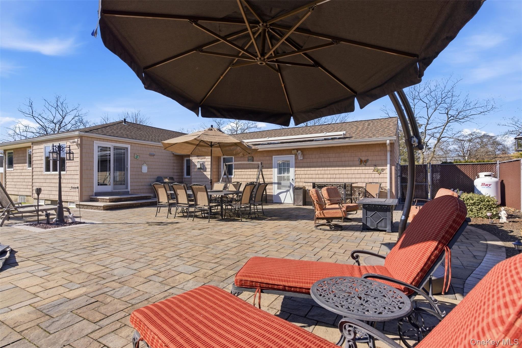 15 Leeward Lane Commack, NY 11725 - Photo 21 of 26 a outdoor view with a sitting space