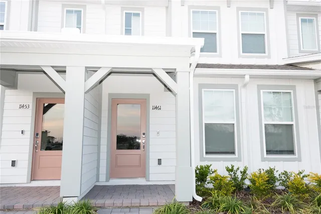 a kitchen with stainless steel appliances a refrigerator a sink a stove a microwave and cabinets