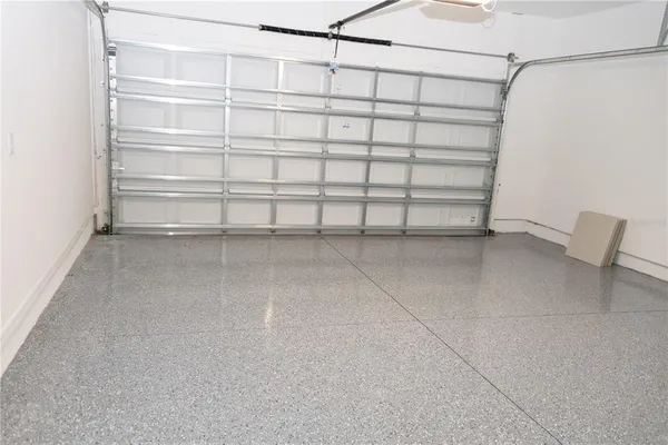 a view of a swimming pool with chairs