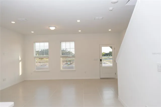 a view of an empty room and window