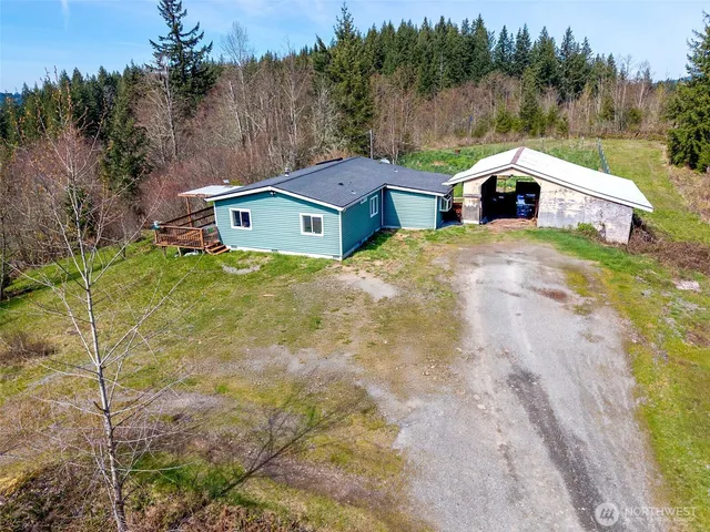 a view of a yard with a bench