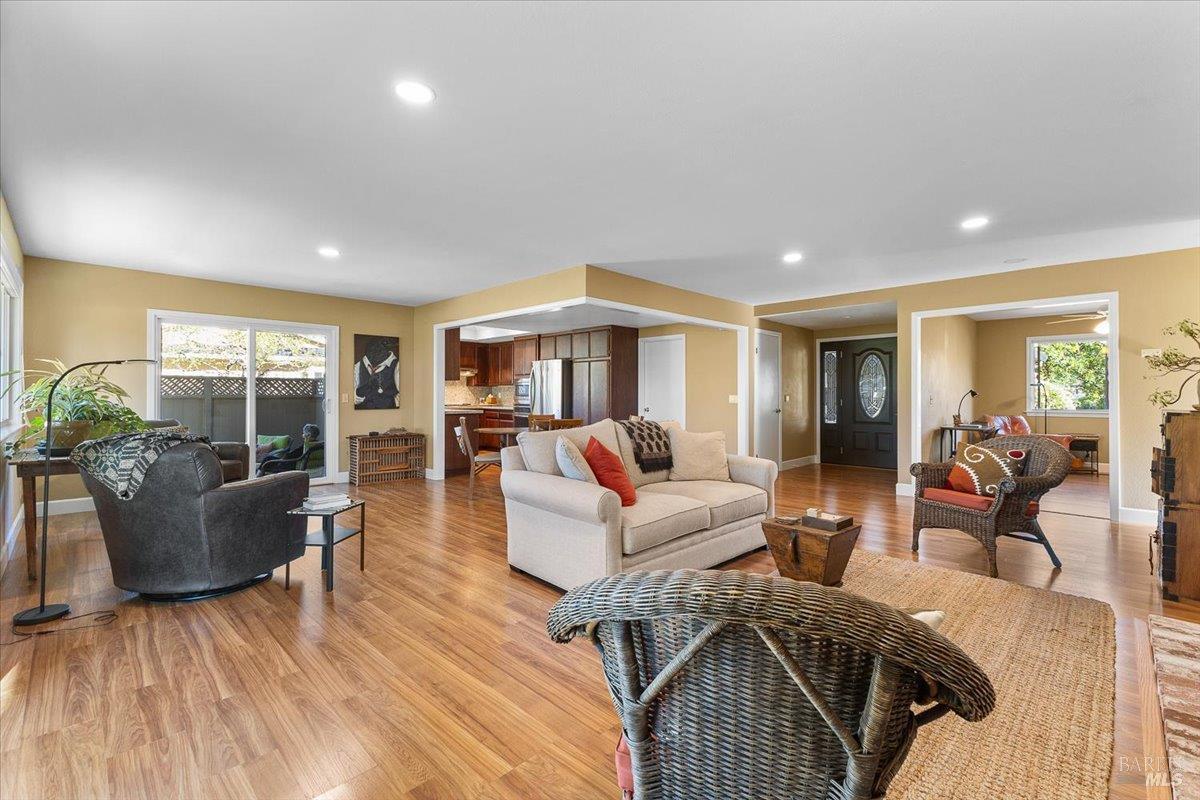 411 Twin Lakes Circle Santa Rosa, CA 95409 - Photo 12 of 41 a living room with furniture and a wooden floor
