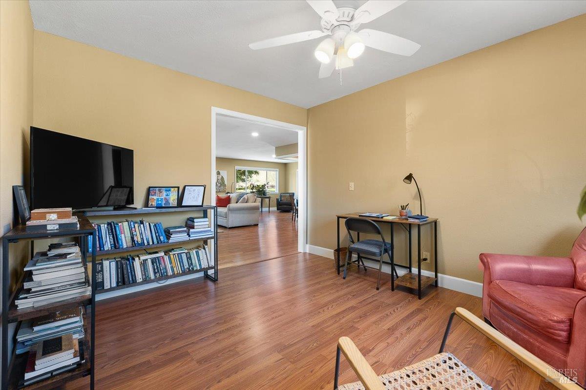 411 Twin Lakes Circle Santa Rosa, CA 95409 - Photo 14 of 41 a living room with furniture and a flat screen tv