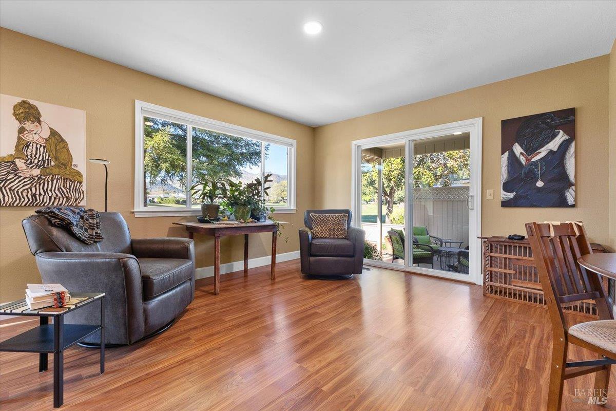 411 Twin Lakes Circle Santa Rosa, CA 95409 - Photo 17 of 41 a living room with furniture and a large window