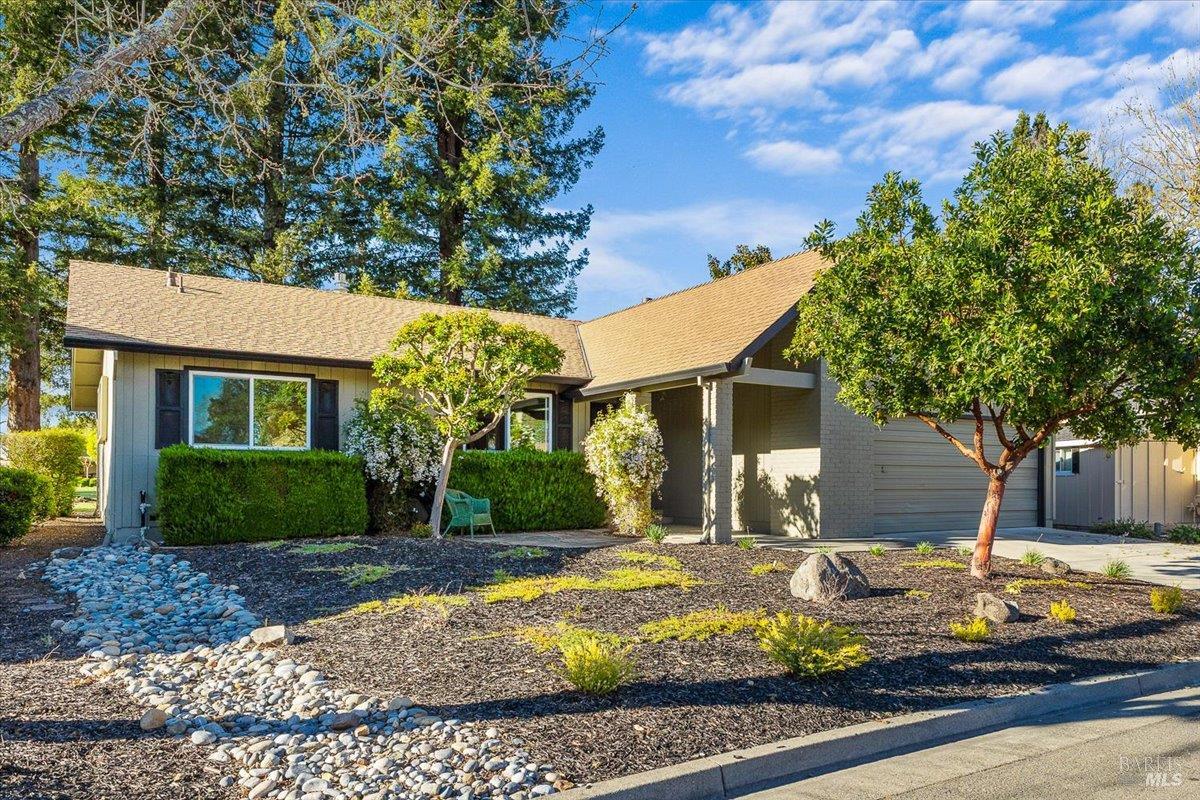 411 Twin Lakes Circle Santa Rosa, CA 95409 - Photo 2 of 41 a front view of a house with garden