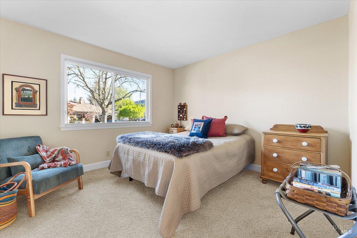 411 Twin Lakes Circle Santa Rosa, CA 95409 - Photo 21 of 41 a bedroom with a bed and a window
