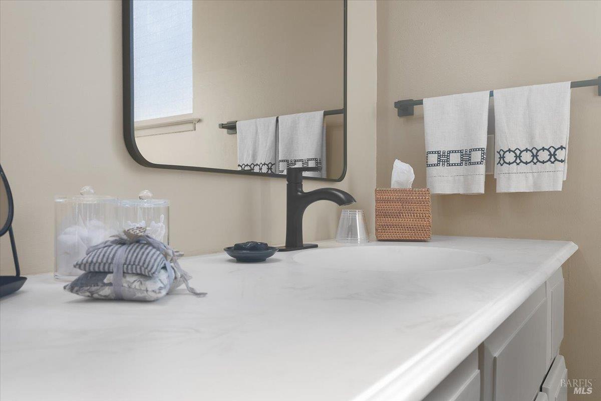 411 Twin Lakes Circle Santa Rosa, CA 95409 - Photo 25 of 41 a kitchen with a sink and a cabinets