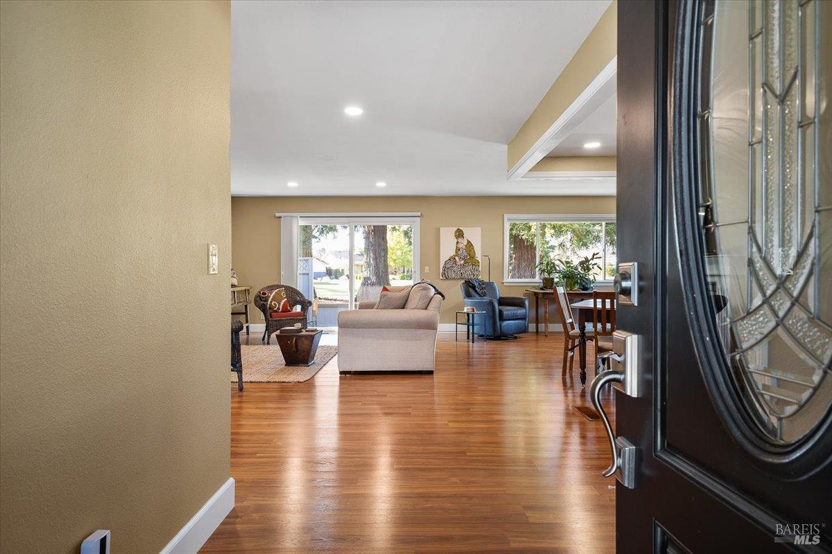 411 Twin Lakes Circle Santa Rosa, CA 95409 - Photo 4 of 41 a living room with furniture and a large window