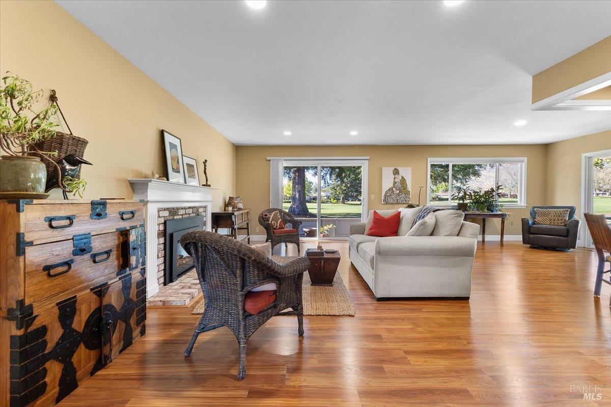 411 Twin Lakes Circle Santa Rosa, CA 95409 - Photo 6 of 41 a living room with furniture and a fireplace