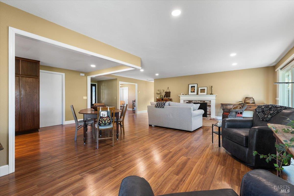 411 Twin Lakes Circle Santa Rosa, CA 95409 - Photo 10 of 41 a living room with furniture and a wooden floor