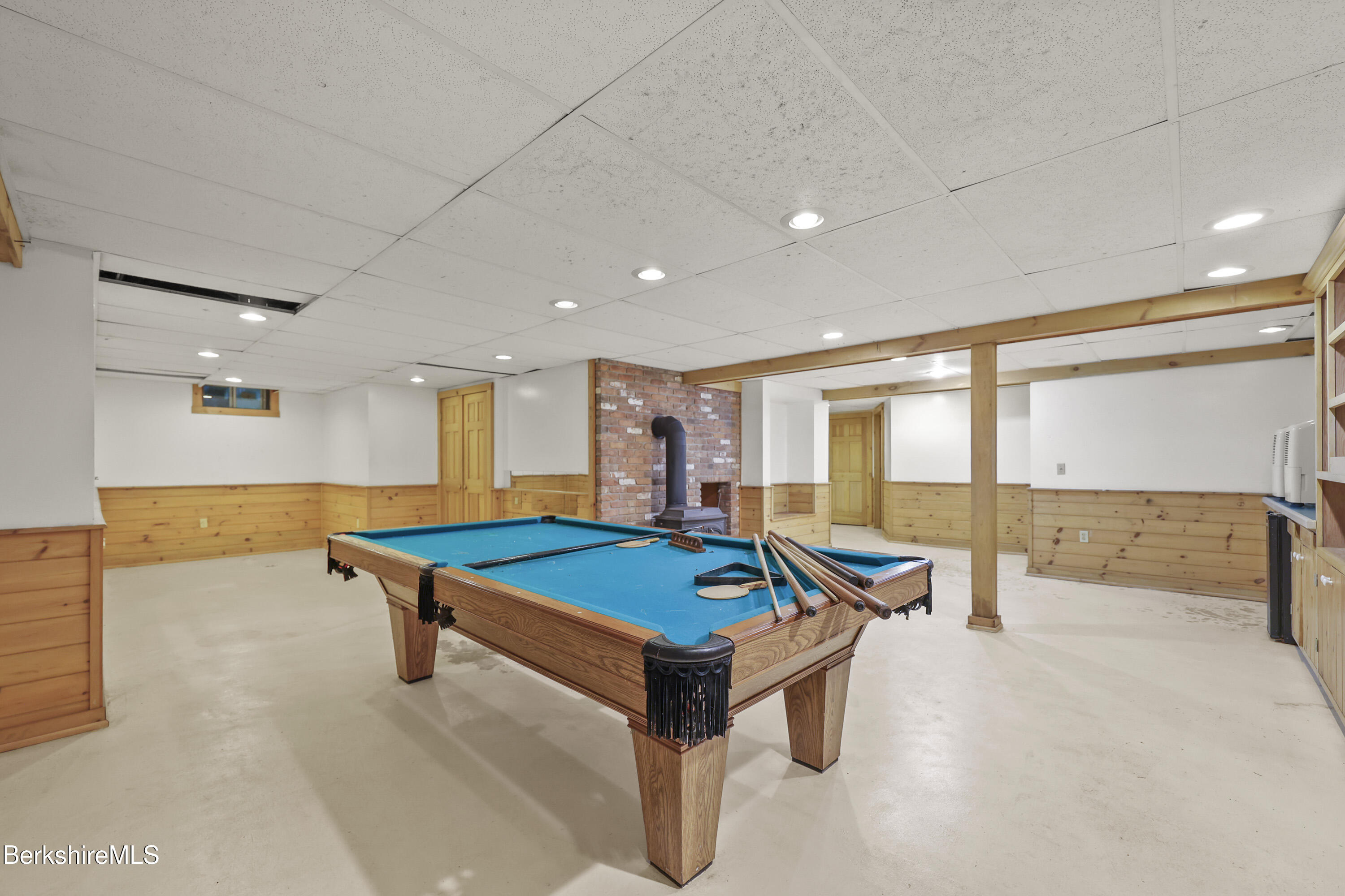1030 Simonds Road Williamstown, MA 01267 - Photo 51 of 76 a living room with furniture pool table and a table