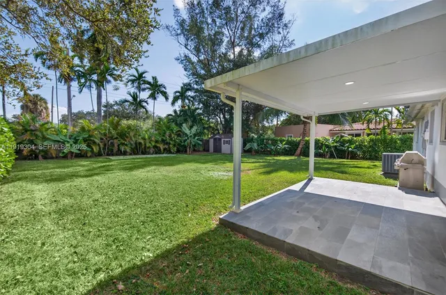 a view of a yard with porch