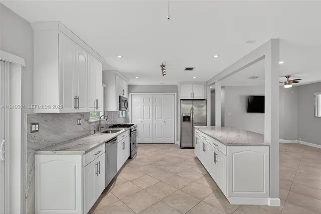 a kitchen with a stove and a microwave