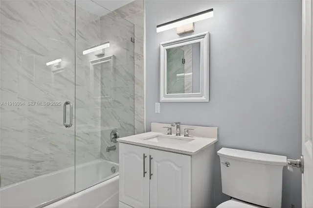 a view of room with window and ceiling fan