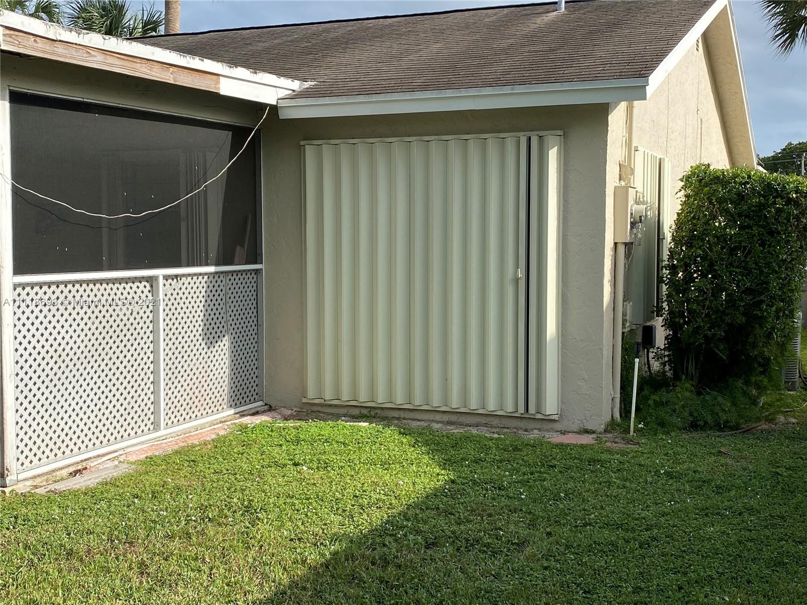9191 Southwest 18th Road Boca Raton, FL 33428 - Photo 14 of 23 a view of a backyard