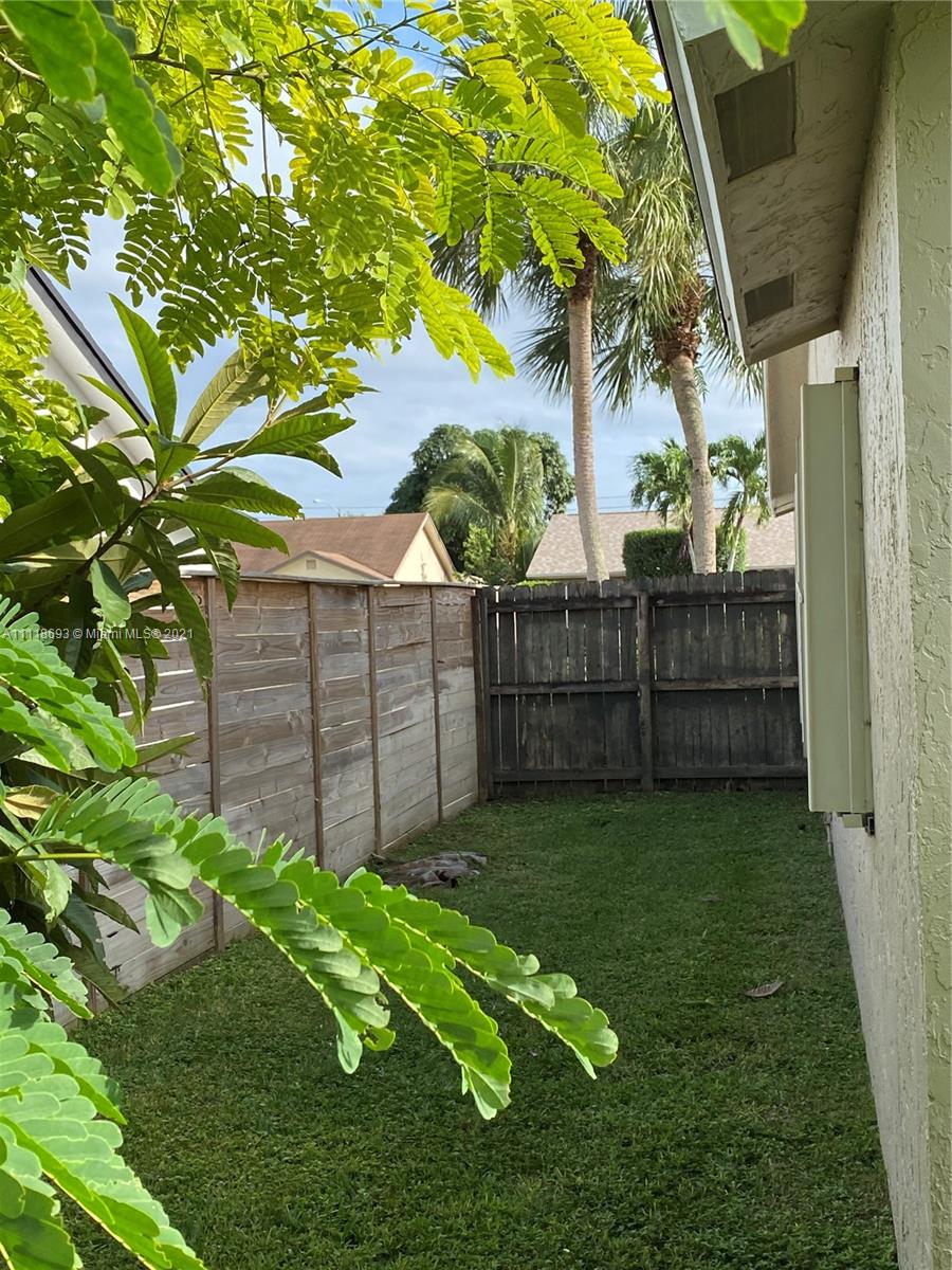 9191 Southwest 18th Road Boca Raton, FL 33428 - Photo 16 of 23 a view of a backyard