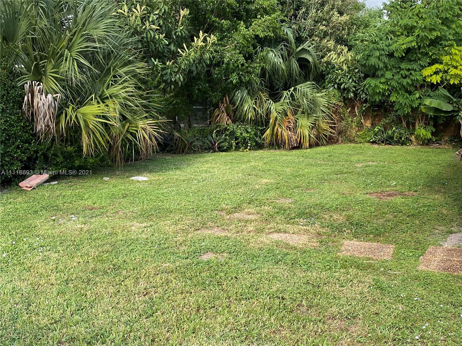 9191 Southwest 18th Road Boca Raton, FL 33428 - Photo 18 of 23 a view of a yard with a tree