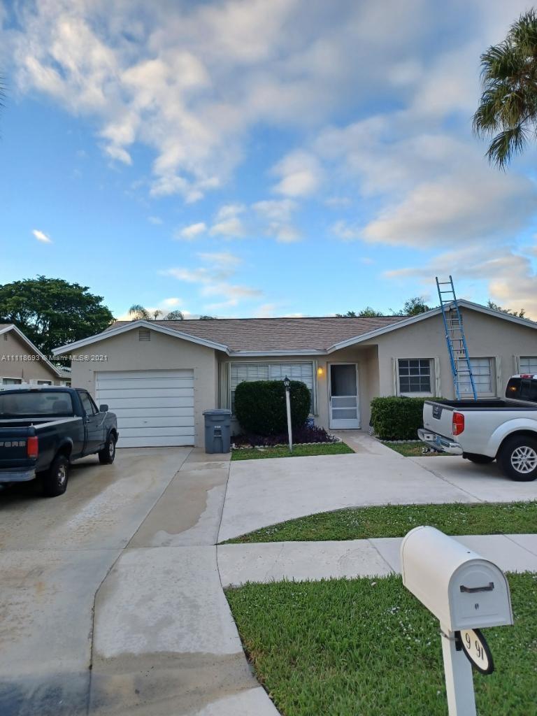 9191 Southwest 18th Road Boca Raton, FL 33428 - Photo 2 of 23 a view of a house with a yard