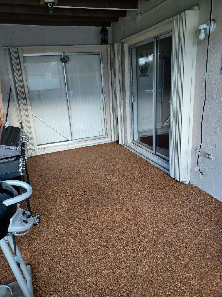 9191 Southwest 18th Road Boca Raton, FL 33428 - Photo 21 of 23 an empty room with shelves