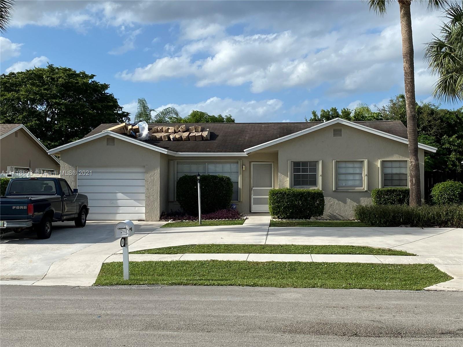 9191 Southwest 18th Road Boca Raton, FL 33428 - Photo 8 of 23 a view of house with a yard in front of it