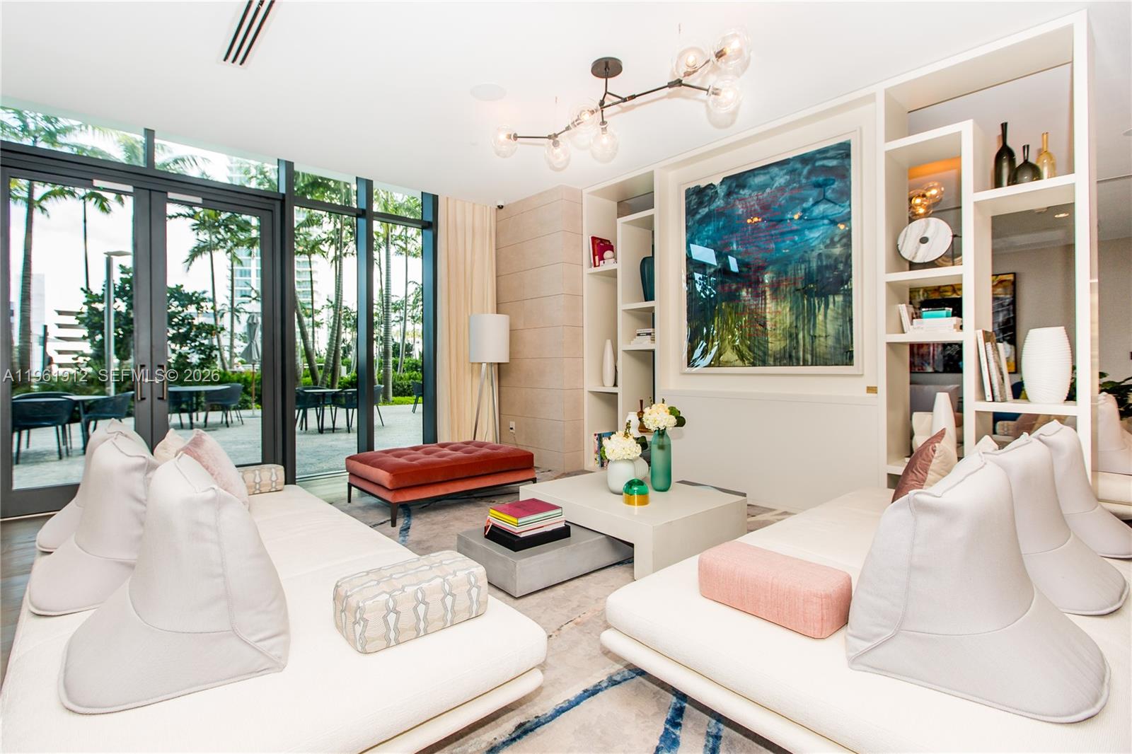 650 Northeast 32nd Street, Unit 2205 Miami, FL 33137 - Photo 32 of 56 a living room with furniture and large windows