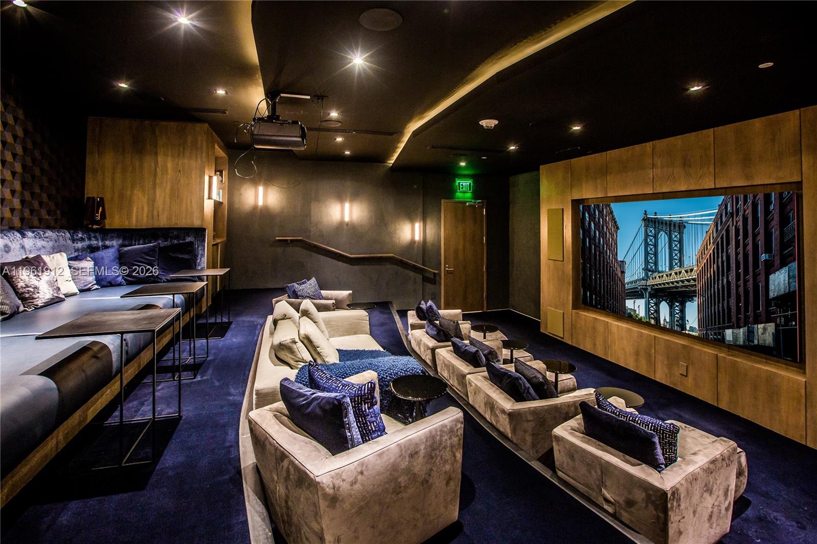 650 Northeast 32nd Street, Unit 2205 Miami, FL 33137 - Photo 52 of 56 a living room with furniture and a flat screen tv