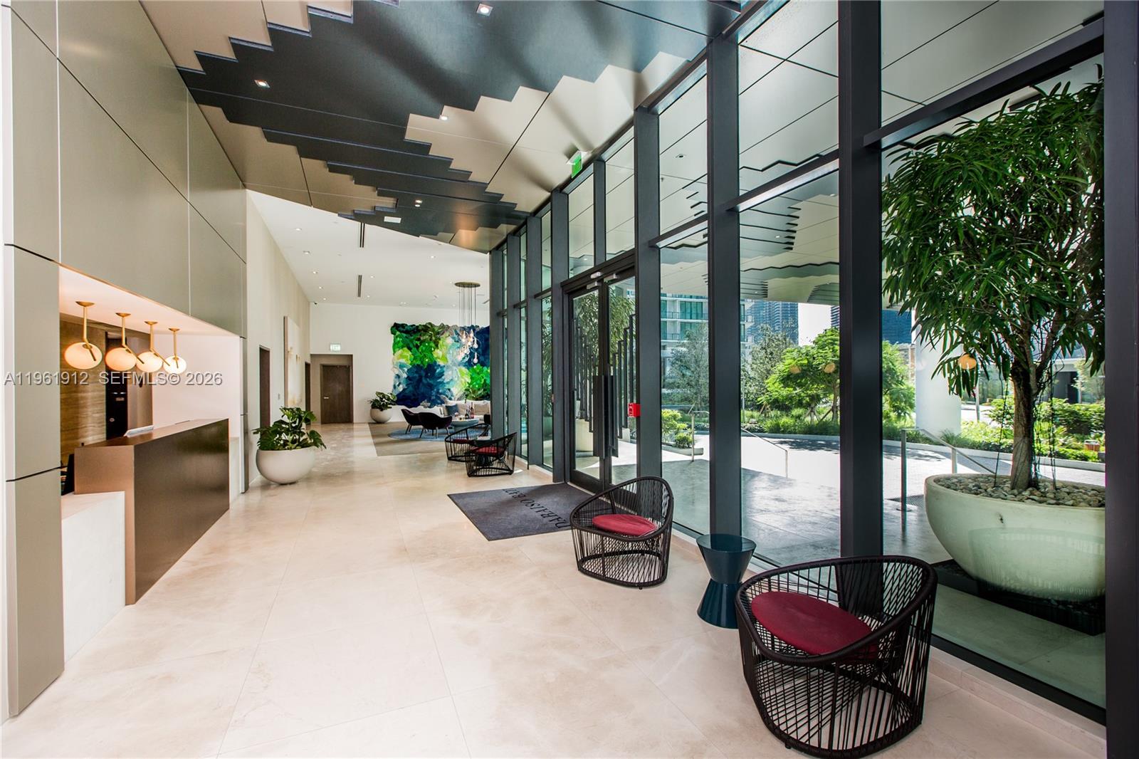 650 Northeast 32nd Street, Unit 2205 Miami, FL 33137 - Photo 54 of 56 a room with furniture and a large window