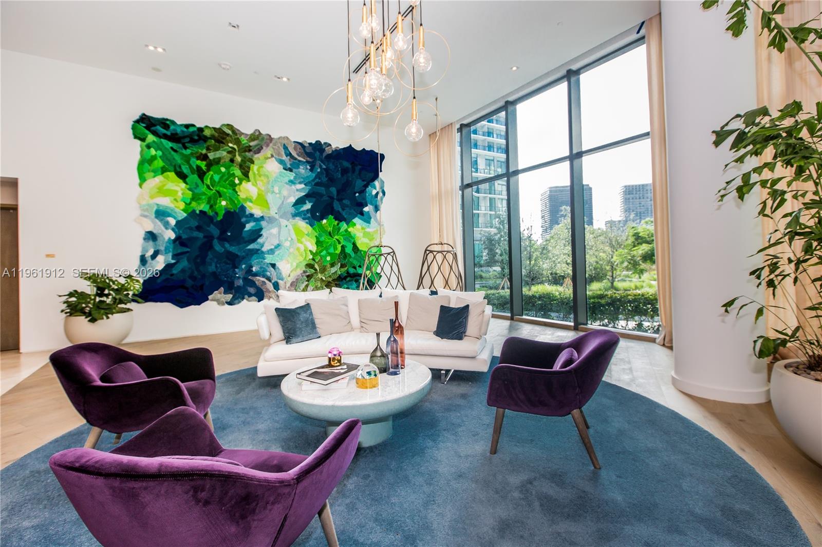 650 Northeast 32nd Street, Unit 2205 Miami, FL 33137 - Photo 56 of 56 a outdoor space with patio couch and a potted plant