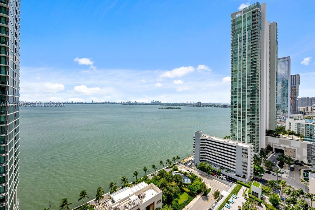 650 Northeast 32nd Street, Unit 2205 Miami, FL 33137 - Photo 7 of 56 a view of a lake with tall buildings