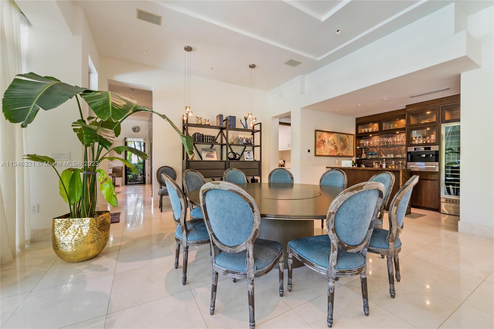 810 Jeronimo Drive Coral Gables, FL 33146 - Photo 17 of 41 a view of a dining room with furniture