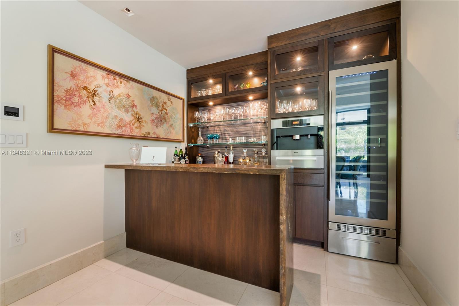 810 Jeronimo Drive Coral Gables, FL 33146 - Photo 18 of 41 a view of a refrigerator in a kitchen