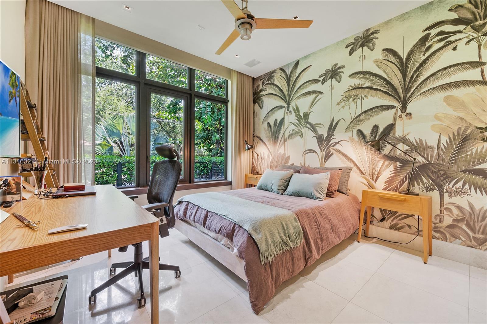 810 Jeronimo Drive Coral Gables, FL 33146 - Photo 30 of 41 a bedroom with a large bed and a window