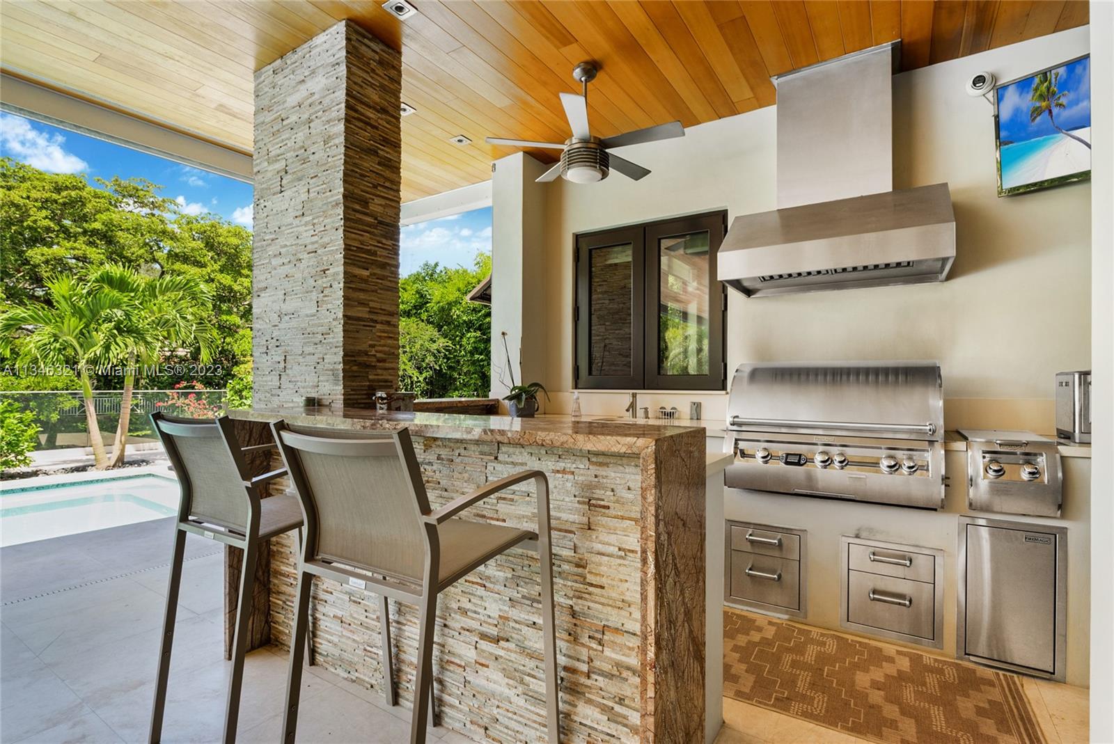 810 Jeronimo Drive Coral Gables, FL 33146 - Photo 34 of 41 a view of a dinning tables and chairs in the patio