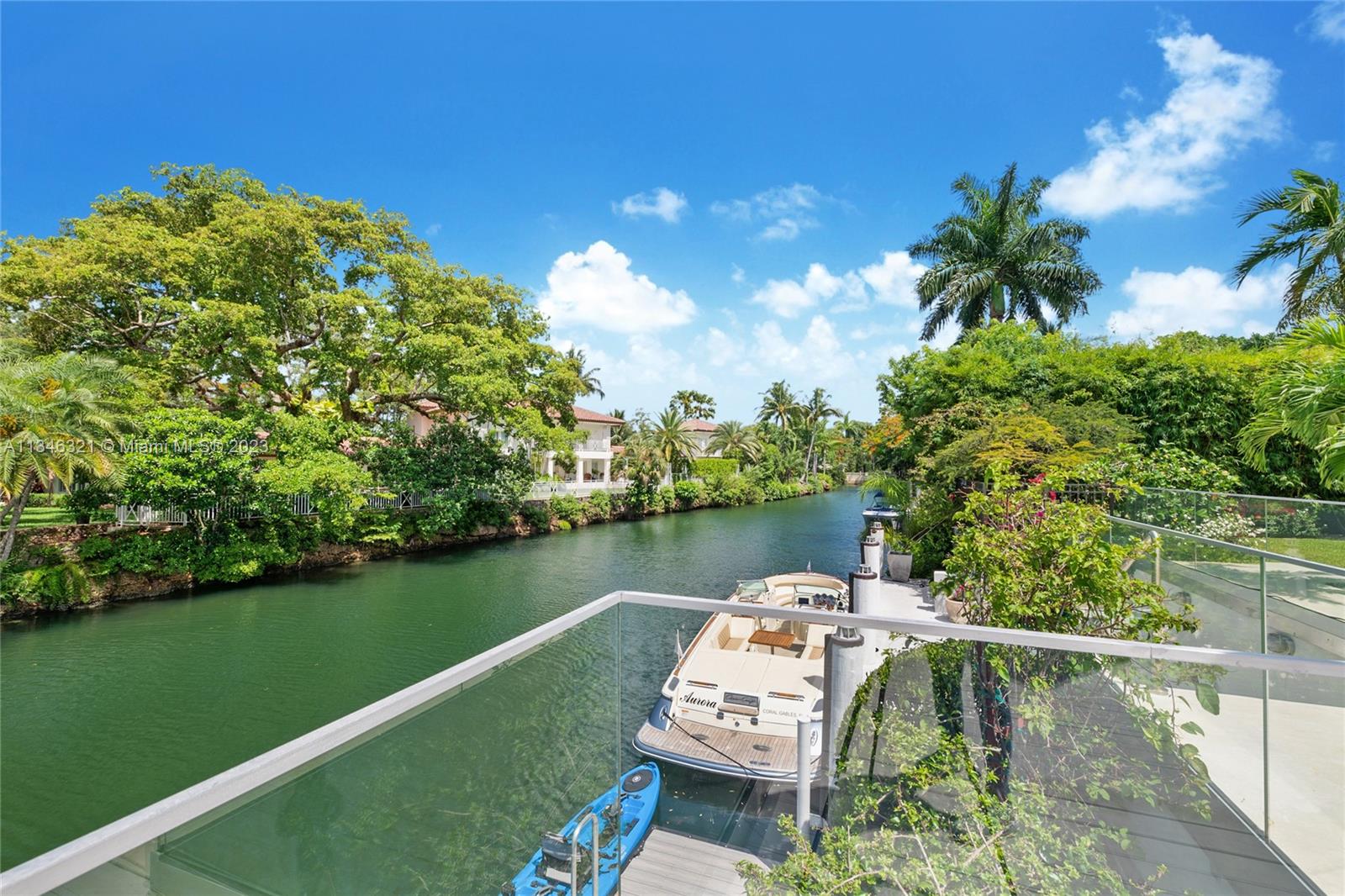 810 Jeronimo Drive Coral Gables, FL 33146 - Photo 35 of 41 a wooden deck with lake view
