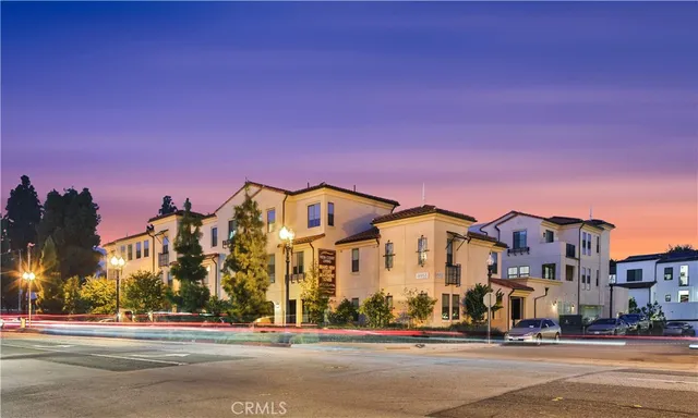 a view of a building with a street