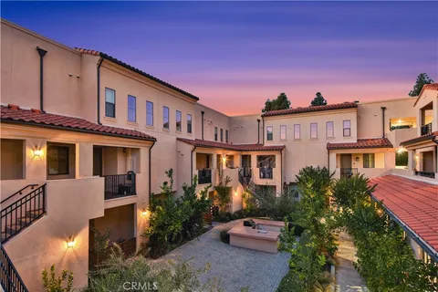 a front view of a multi story residential apartment building