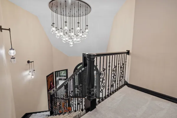 a spacious bedroom with a bed and window