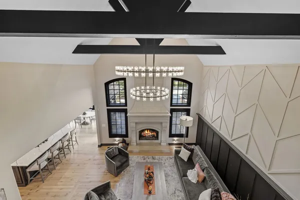 a bathroom with a double vanity sink mirror and toilet