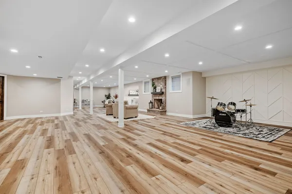 a kitchen with sink and cabinets