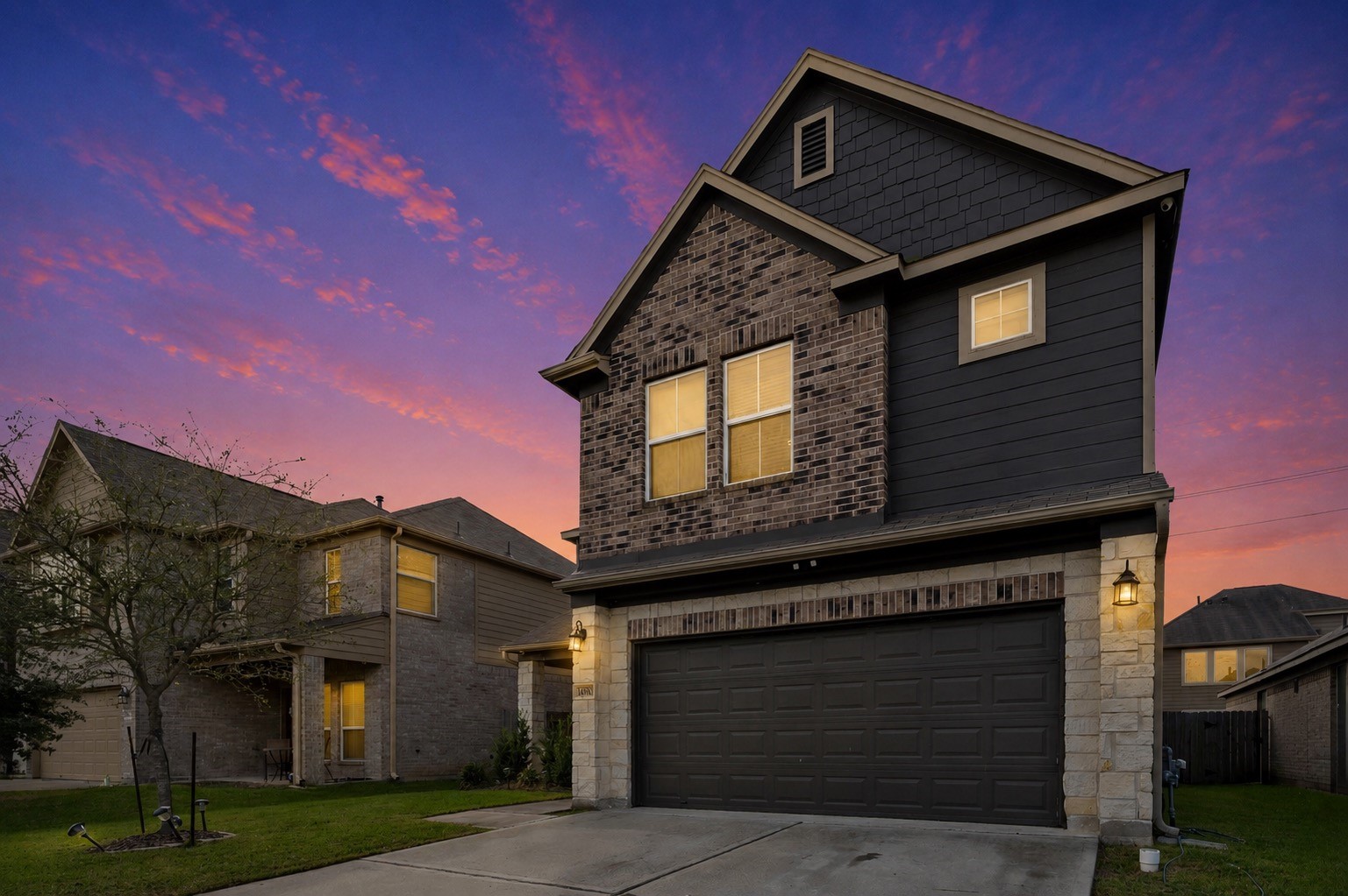 14810 Ruddy Duck Lane Houston, TX 77049 - Photo 1 of 33 a front view of a house with garden